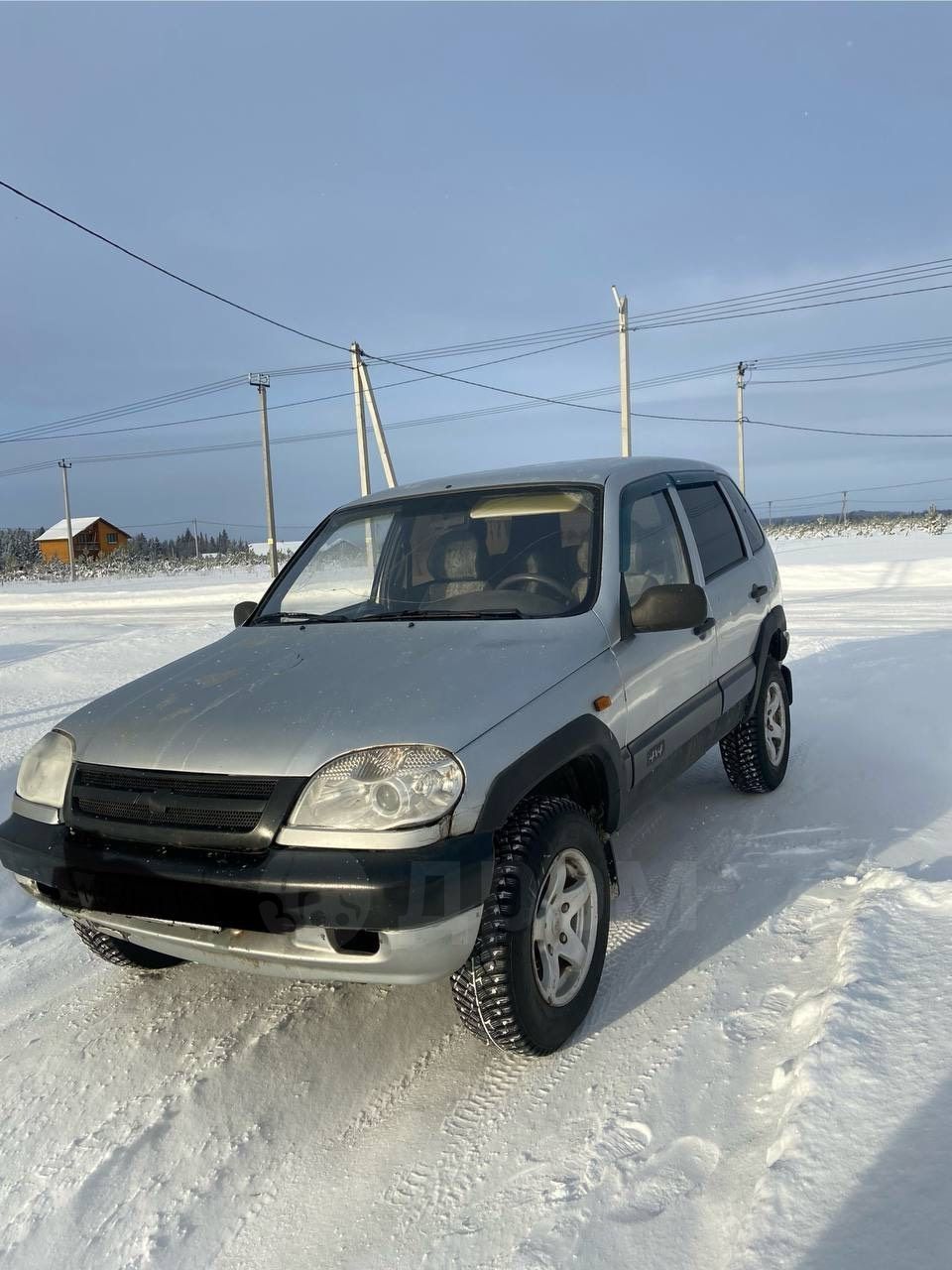 Шевроле Нива 2003 серебристый