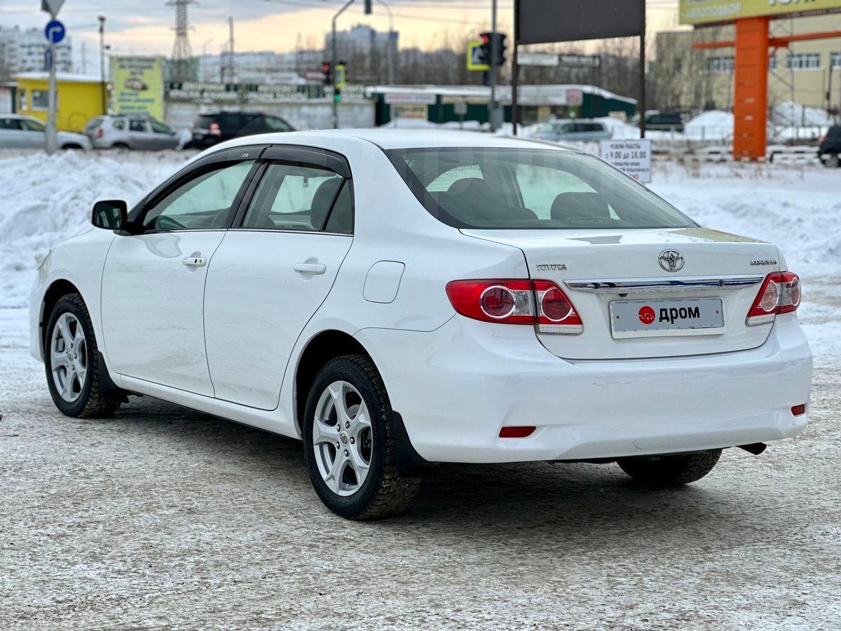 Купить автомобиль Toyota Corolla 2012 г. в Нижневартовске, x2705;  Обслуживание у Официального Дилера, возможен обмен, АКПП, руль левый,  седан, белый, комплектация 1.6 AT Prestige