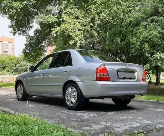  Mazda Familia 2003 , 212000 , 