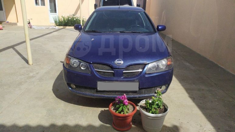  3  Nissan Almera 2004 , 130000 , 